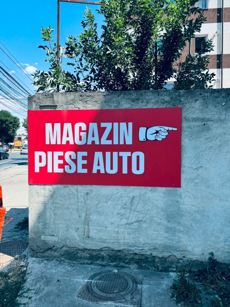 autocolant magazin piese auto